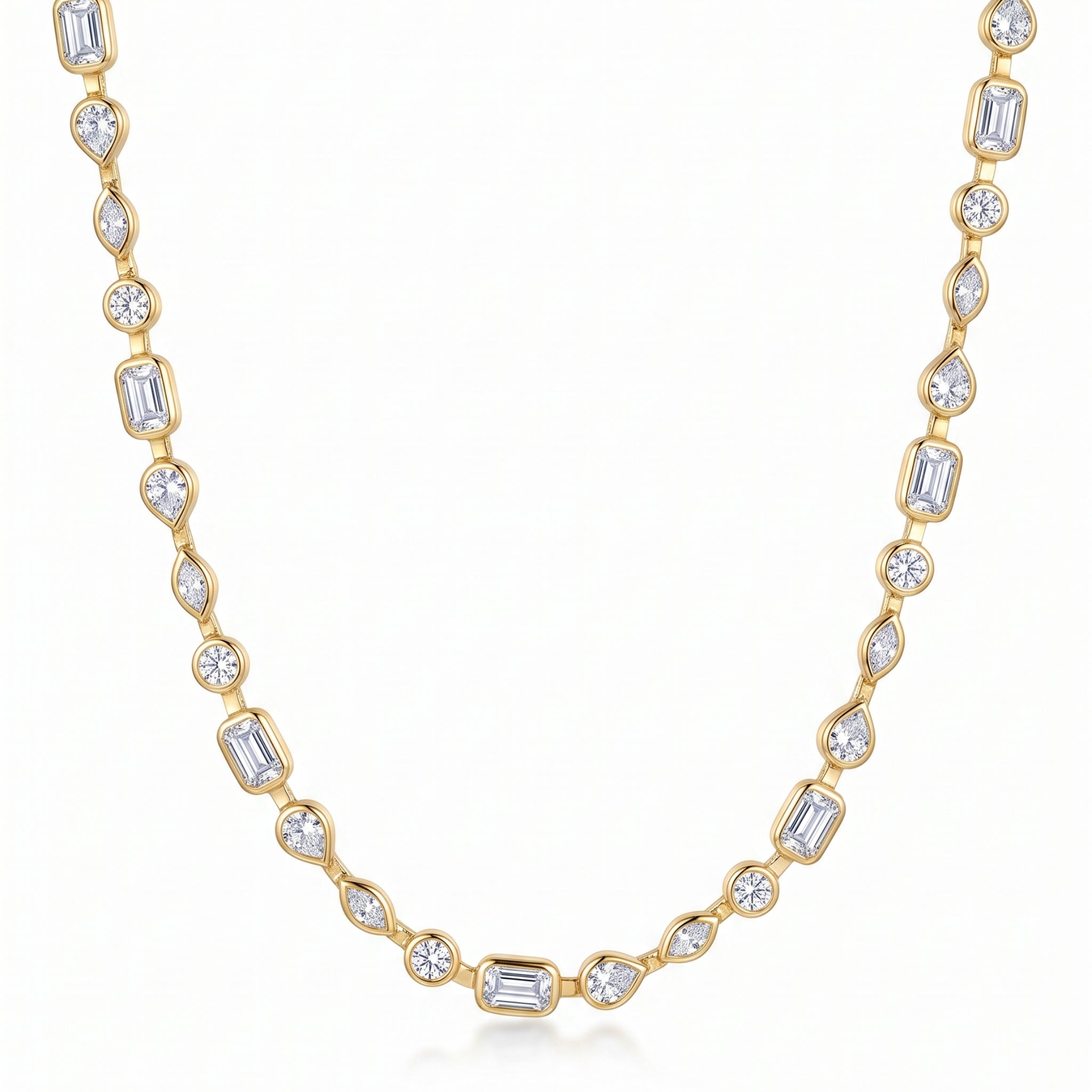 A yellow gold tennis necklace featuring baguette, round, marquise, and teardrop-cut clear gemstones, displayed on a clean white background.
