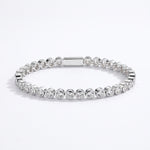 Waterproof Mini Remi bezel-set CZ tennis bracelet in silver surgical stainless steel on white background – Nikki E. Designs