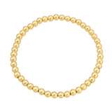 Vida 4mm gold bead stretch bracelet in surgical stainless steel on white background – Nikki E. Designs