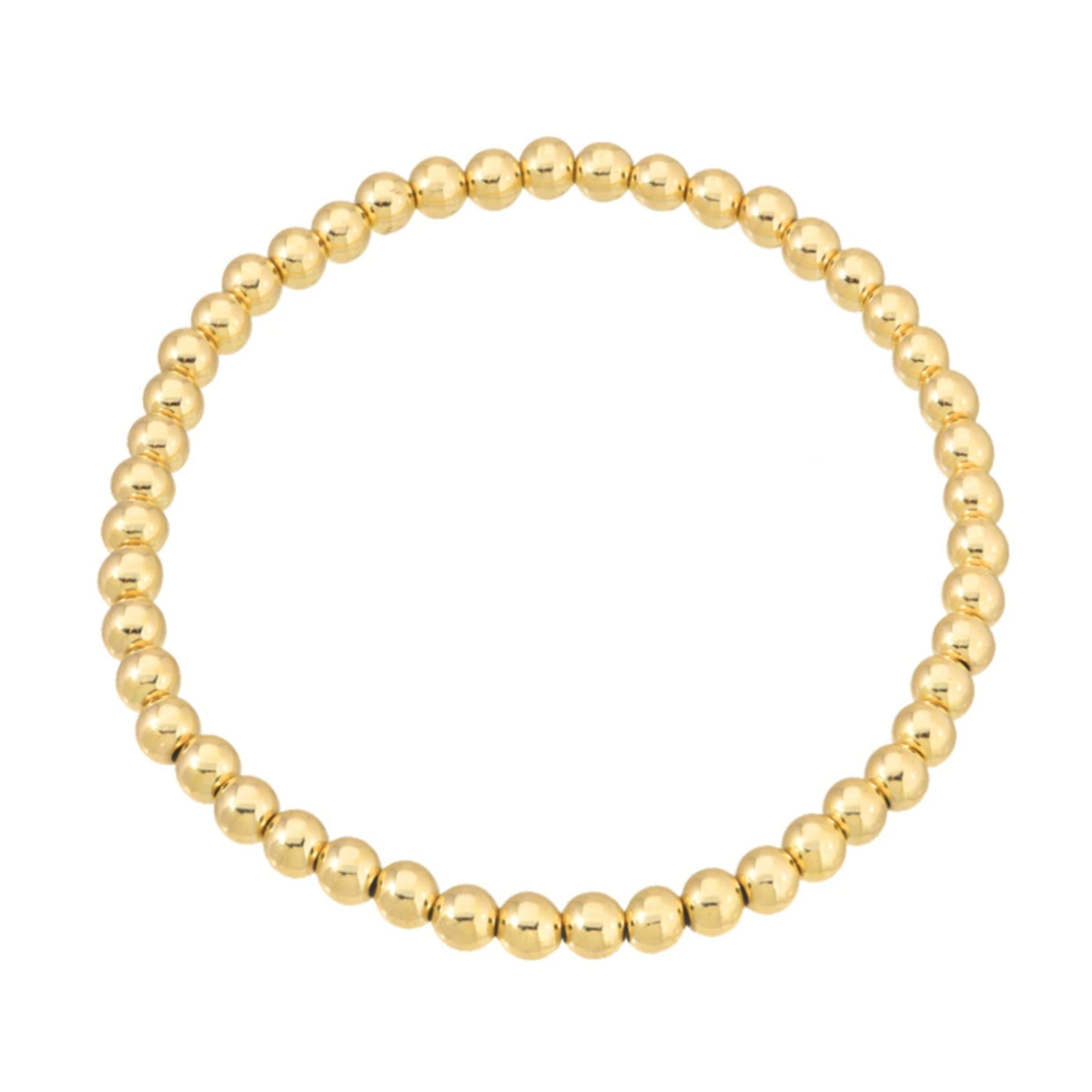 Vida 4mm gold bead stretch bracelet in surgical stainless steel on white background – Nikki E. Designs